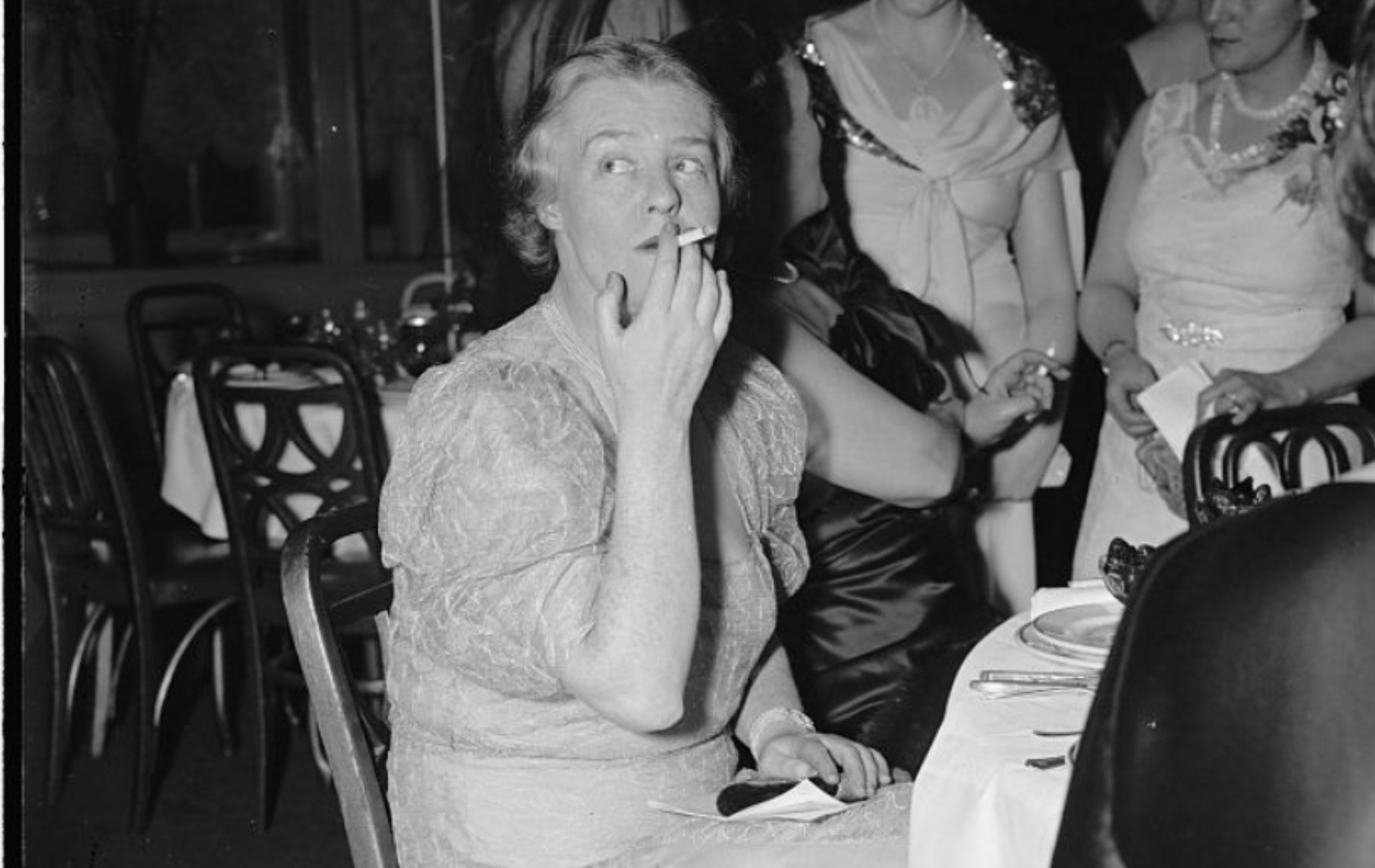 Journalist Dorothy Thompson at a dinner gathering, former owner of Twin Farms in Vermont