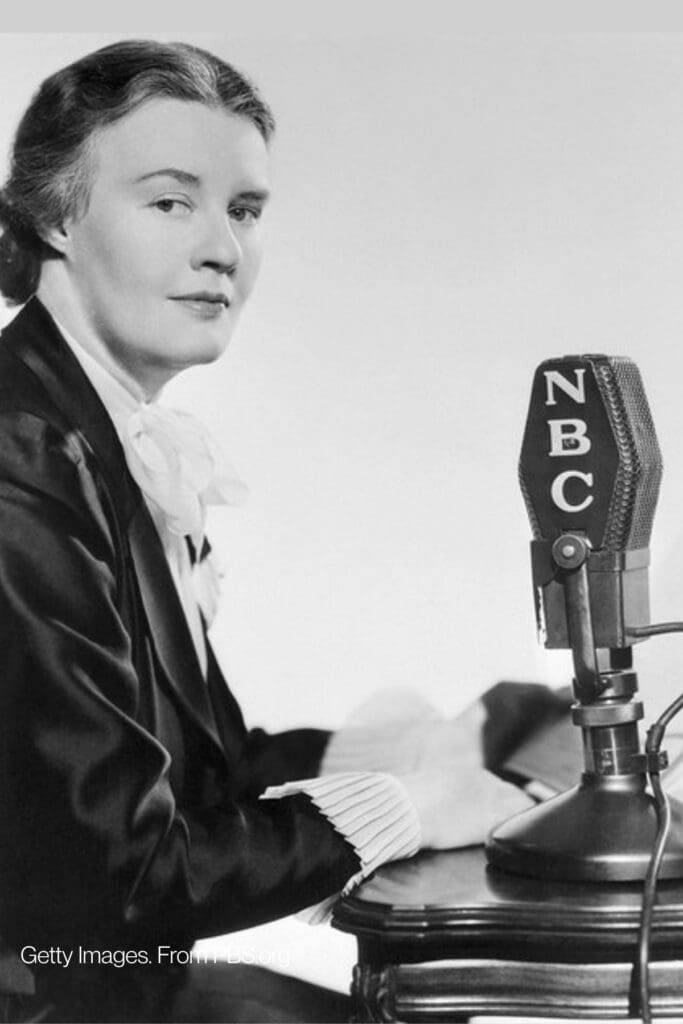 Journalist Dorothy Thompson seated at an NBC microphone during a radio broadcast