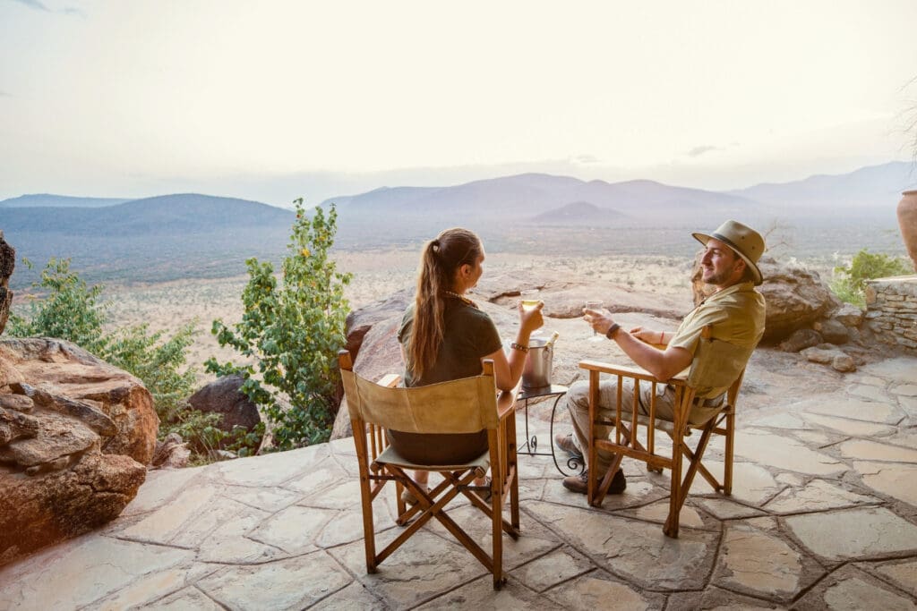 Travelers enjoying a safari experience with confidence knowing their trip is protected