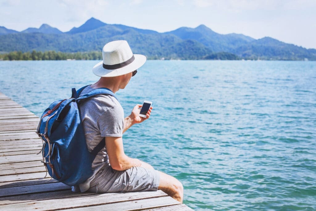 Traveler checking travel information while abroad
