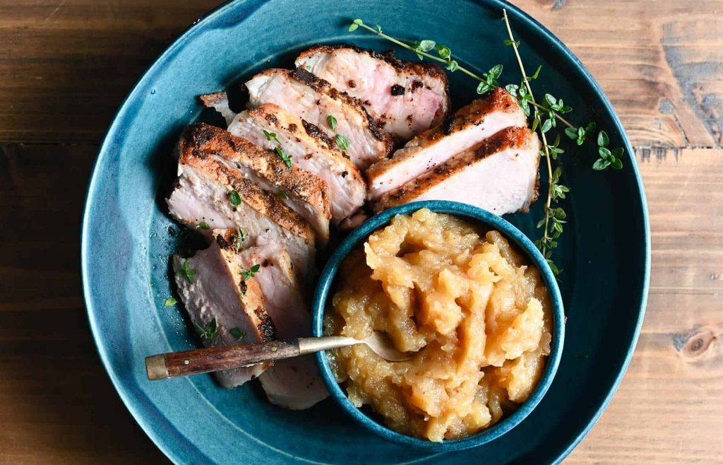 Roast pork served with apple sauce
